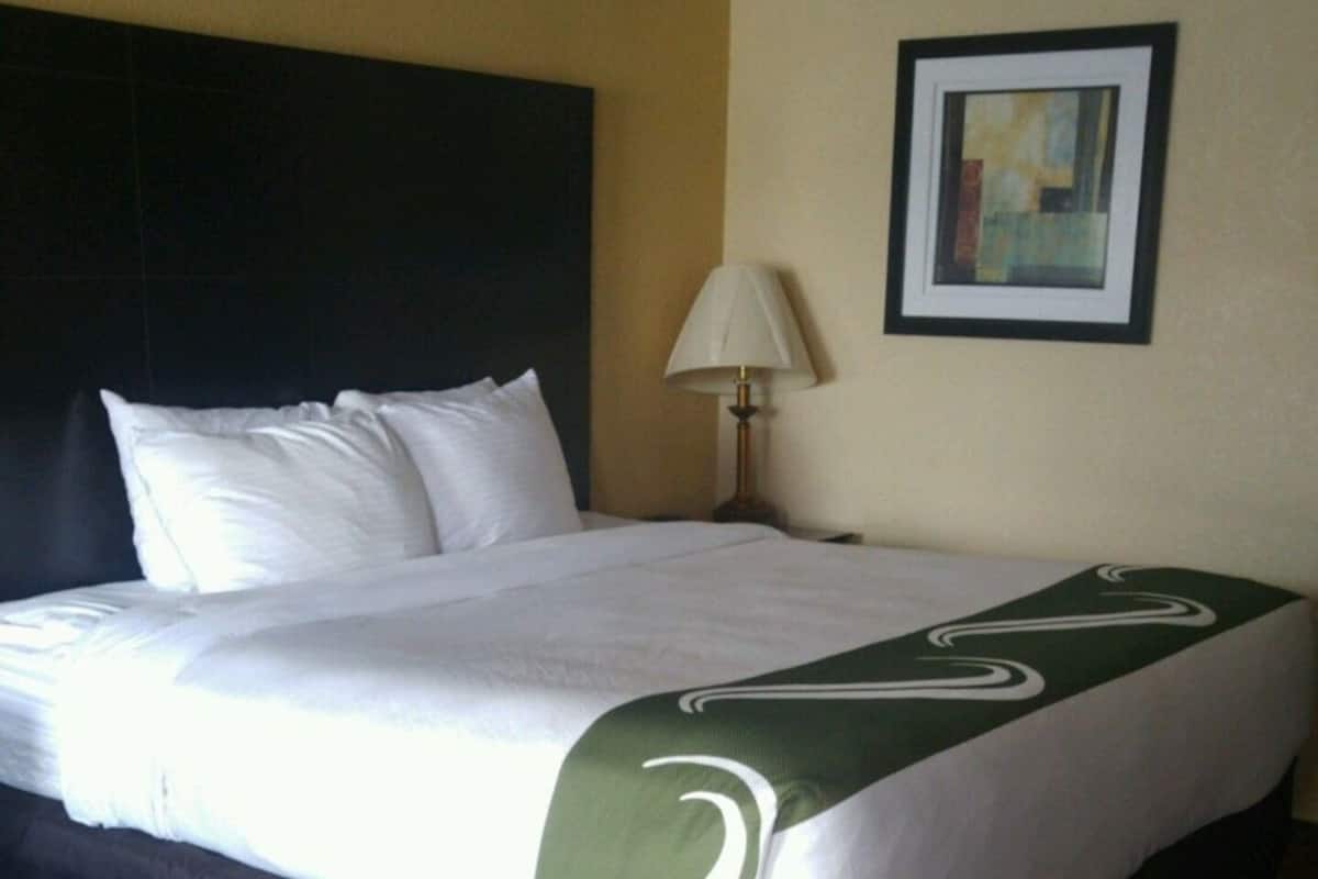 Premium bedding, pillow-top beds, blackout curtains, iron/ironing board