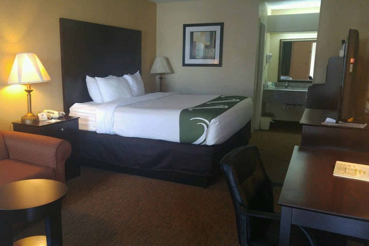 Premium bedding, pillow-top beds, blackout curtains, iron/ironing board