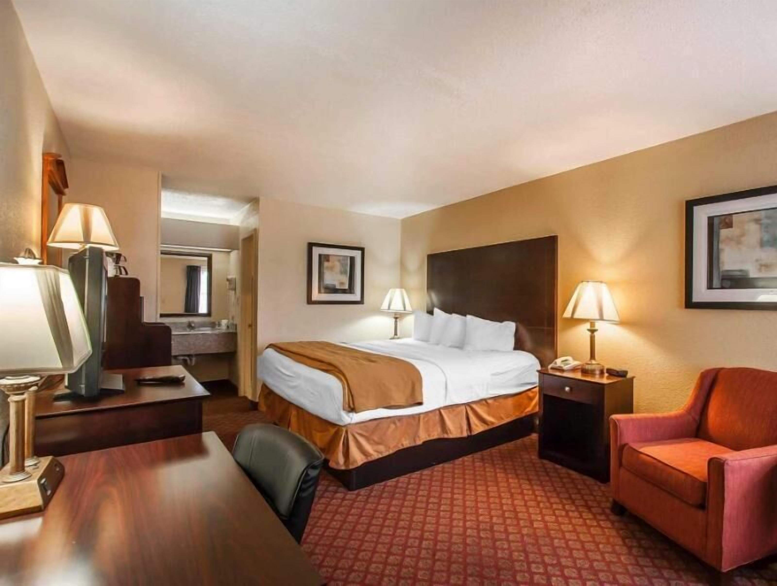 Premium bedding, pillow-top beds, blackout curtains, iron/ironing board