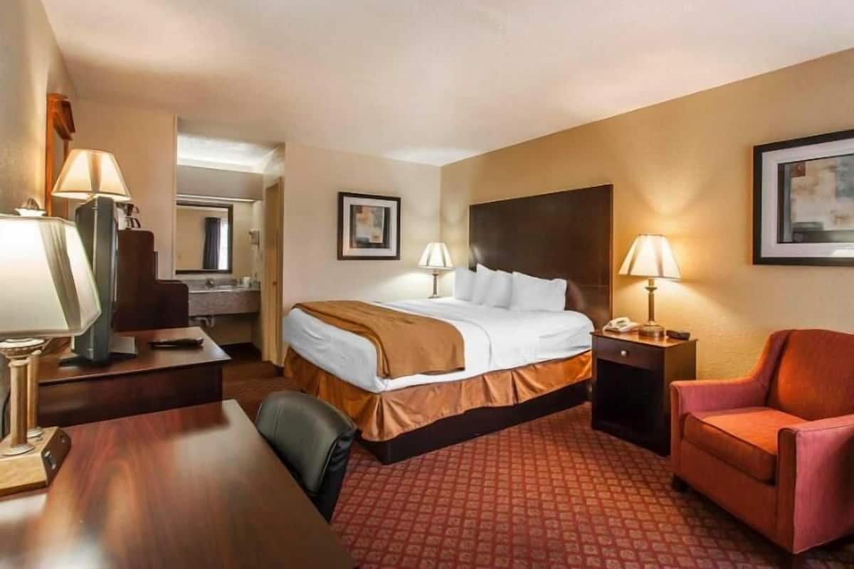 Premium bedding, pillow-top beds, blackout curtains, iron/ironing board