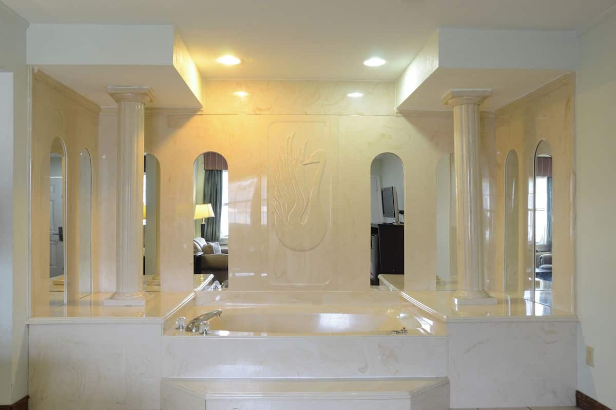 Premium bedding, pillow-top beds, blackout curtains, iron/ironing board