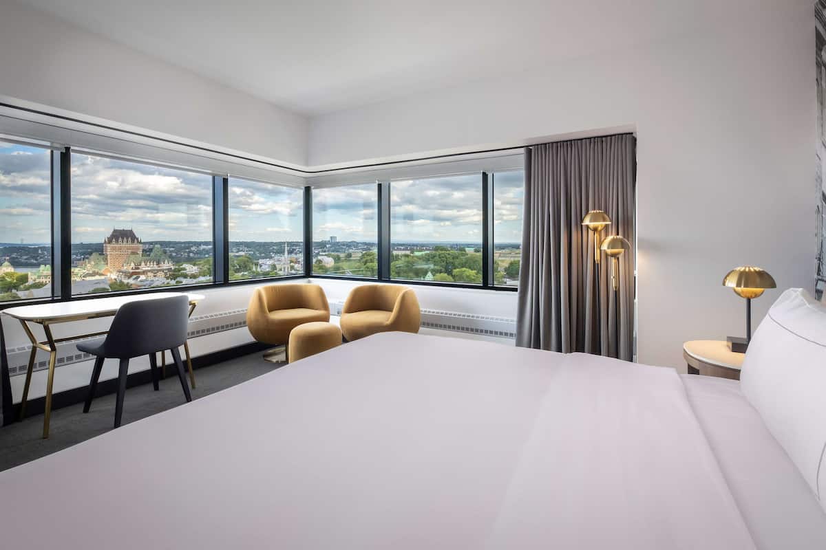 deluxe room, 1 king bed, river view (old quebec) | 1 bedroom, premium bedding, down duvets, in-room safe