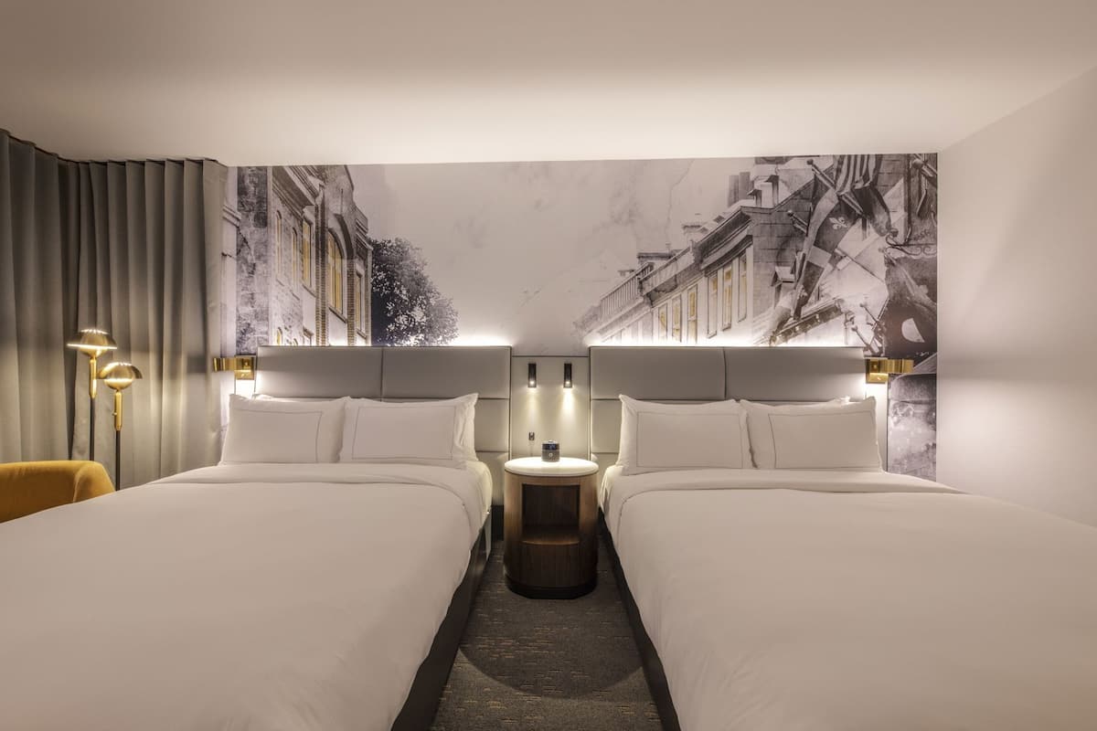 Premium bedding, down comforters, in-room safe, desk