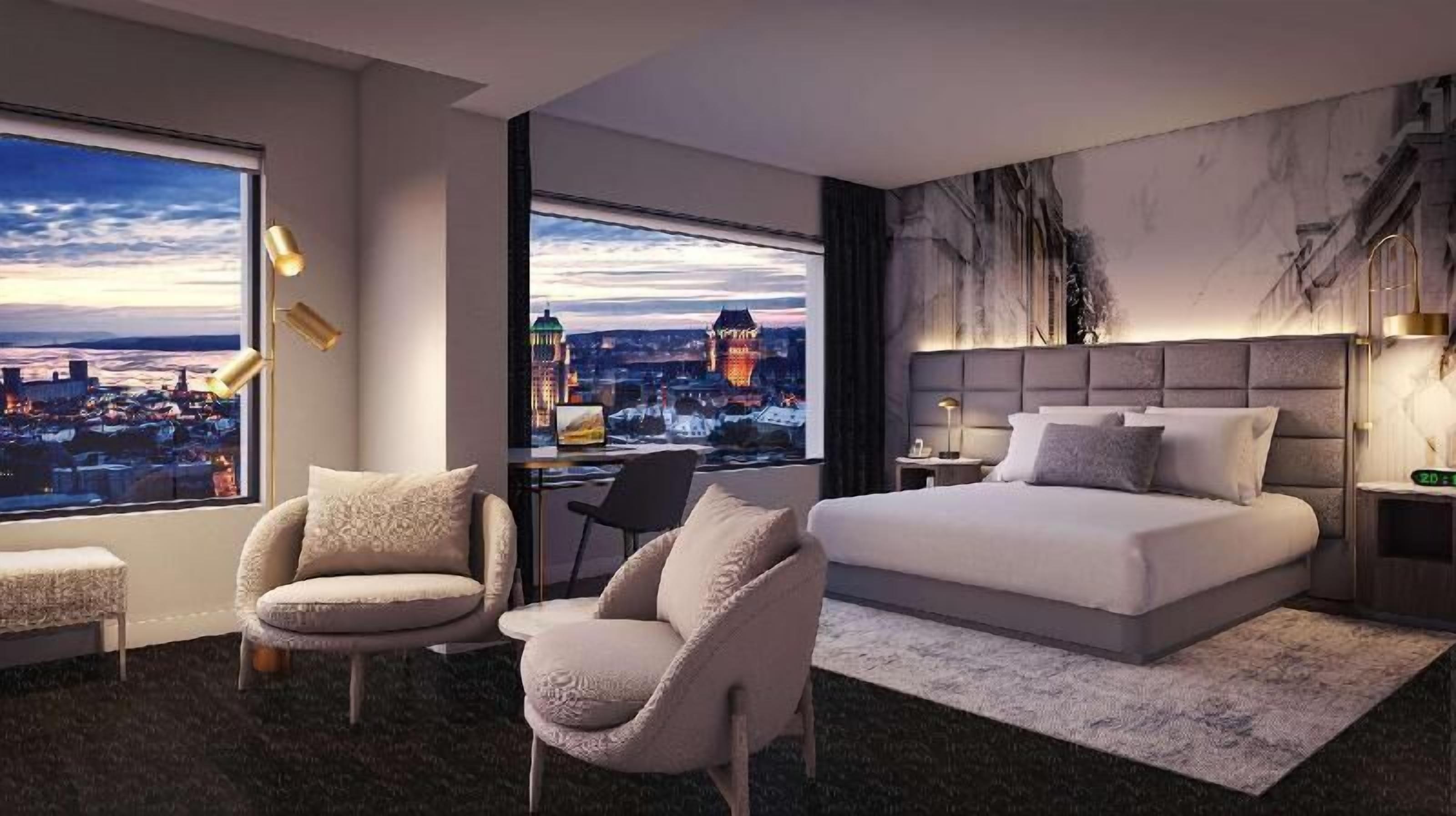 أغطية فراش متميزة وألحفة محشوة بالريش وخزنة داخل الغرفة ومكتب