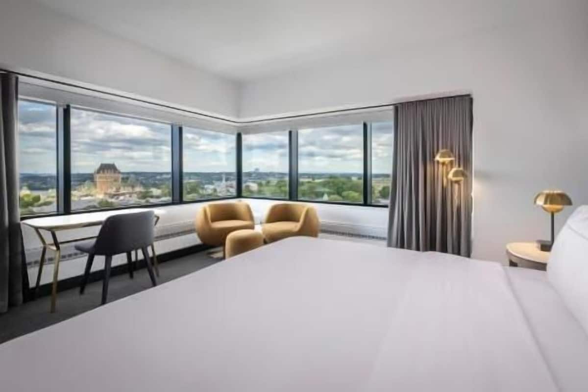 Premium bedding, down comforters, in-room safe, desk