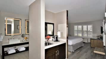 Suite, 1 King Bed | Bathroom | Shower, free toiletries, hair dryer, towels