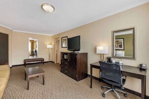 Suite, 1 King Bed with Sofa bed | Living area | 42-inch LCD TV with digital channels, TV