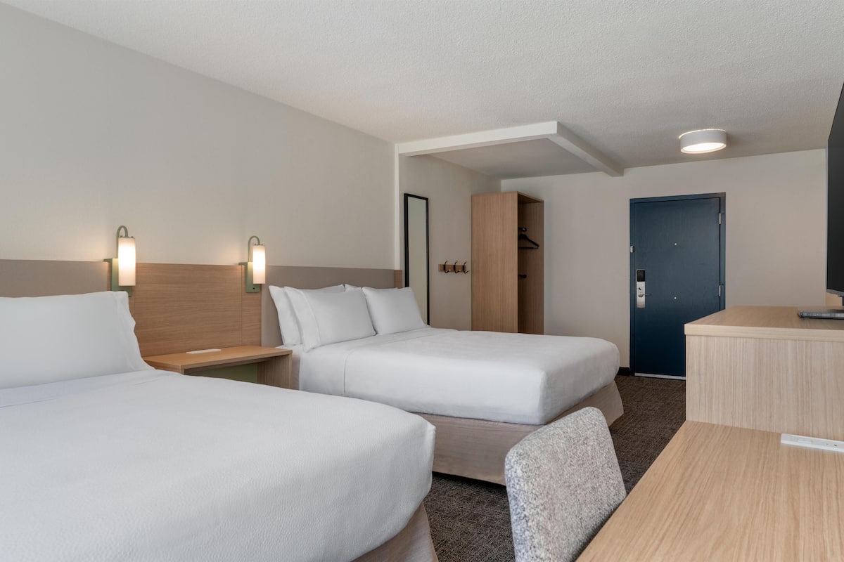 Premium bedding, pillowtop beds, desk, blackout drapes