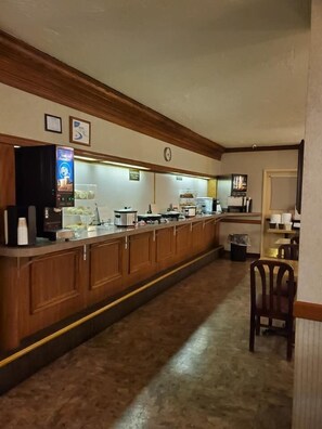 Enjoy a convenient kitchenette with a coffee machine and refrigerator.