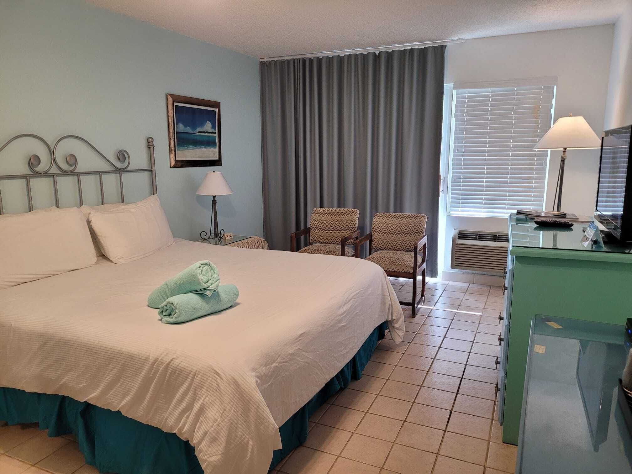 room, courtyard view | in-room safe, iron/ironing board, free wifi, bed sheets