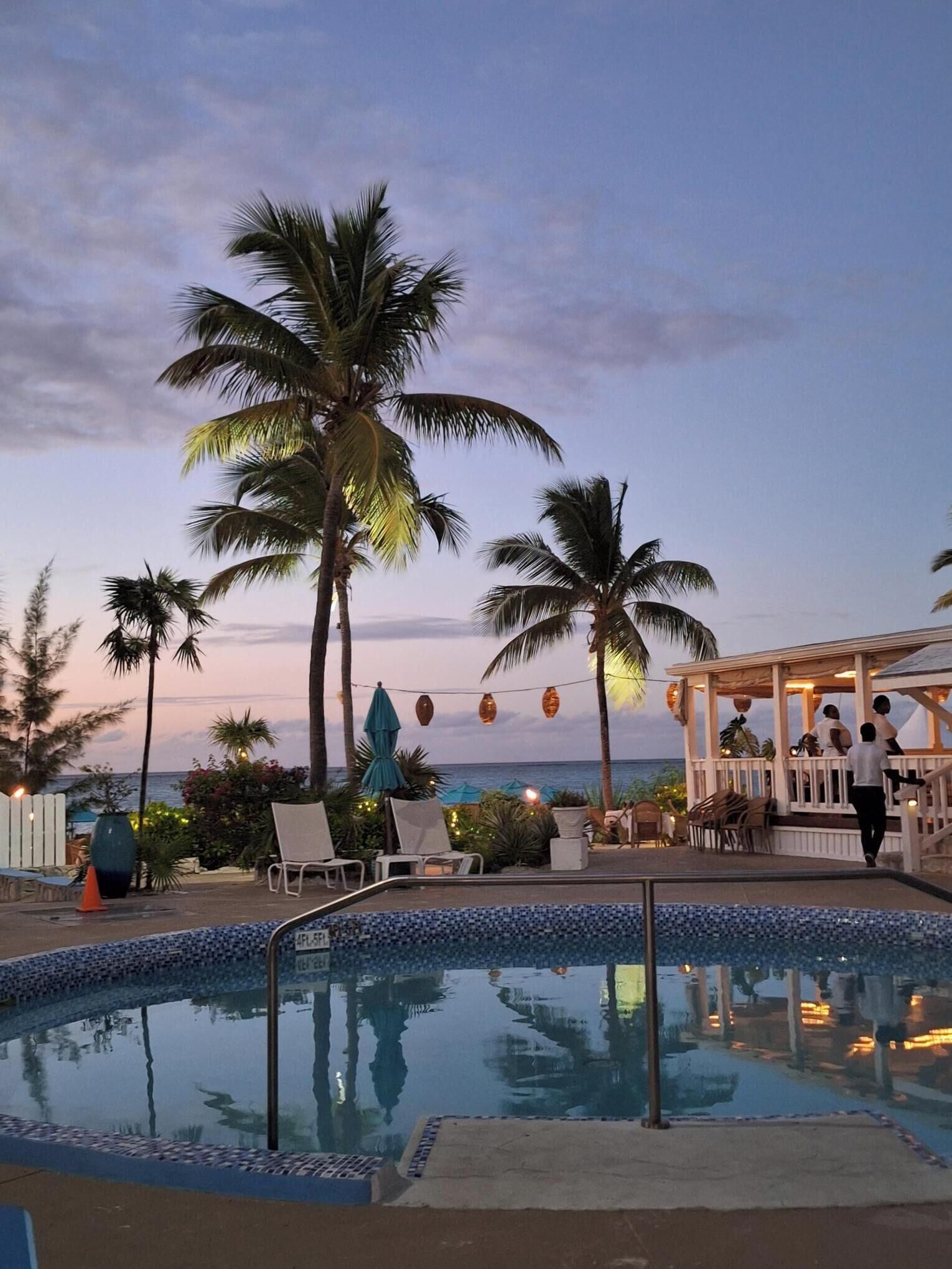 outdoor pool, open 7 am to 10 pm, pool umbrellas, pool loungers