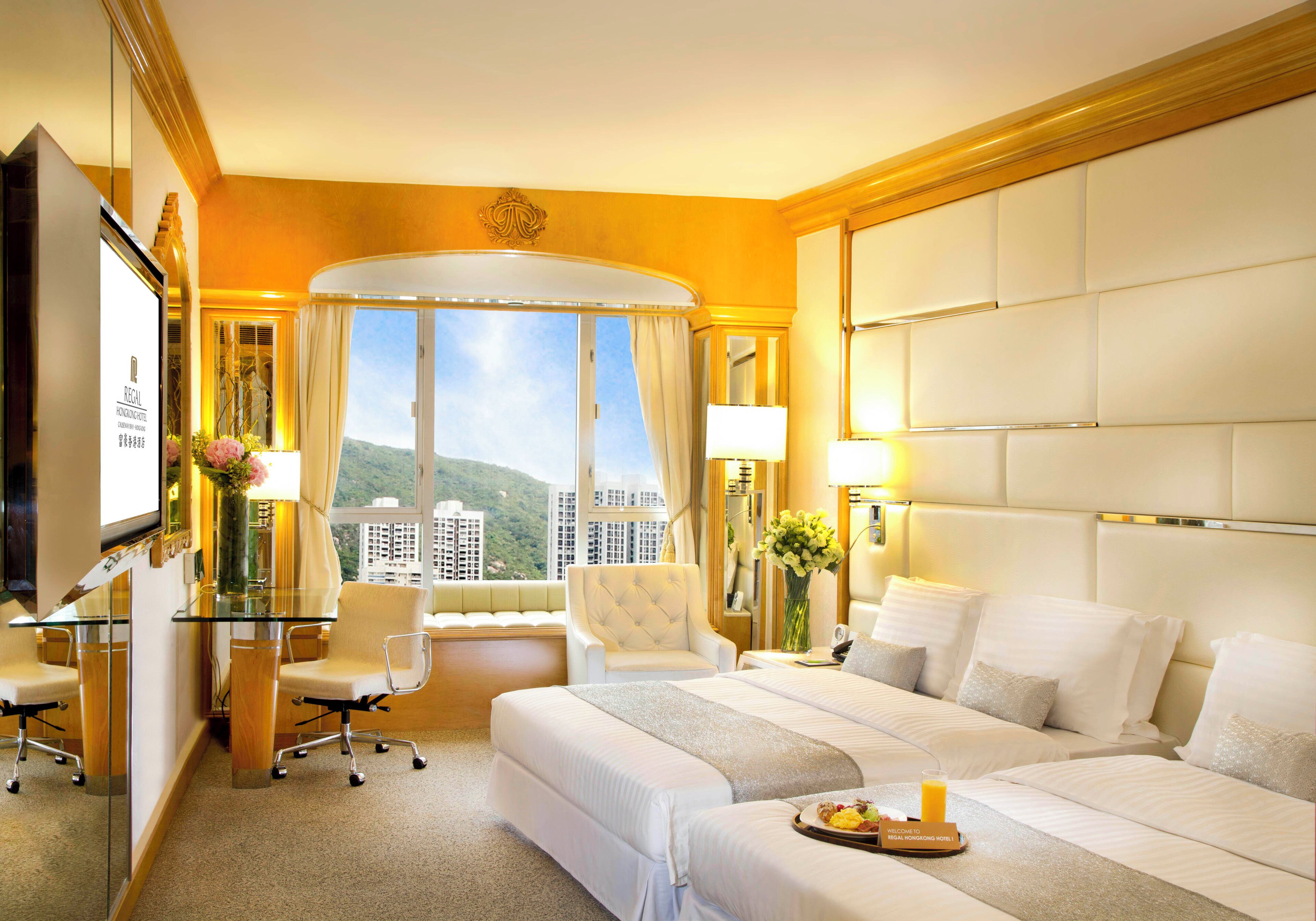 Family Quadruple Room | Minibar, in-room safe, desk, laptop workspace