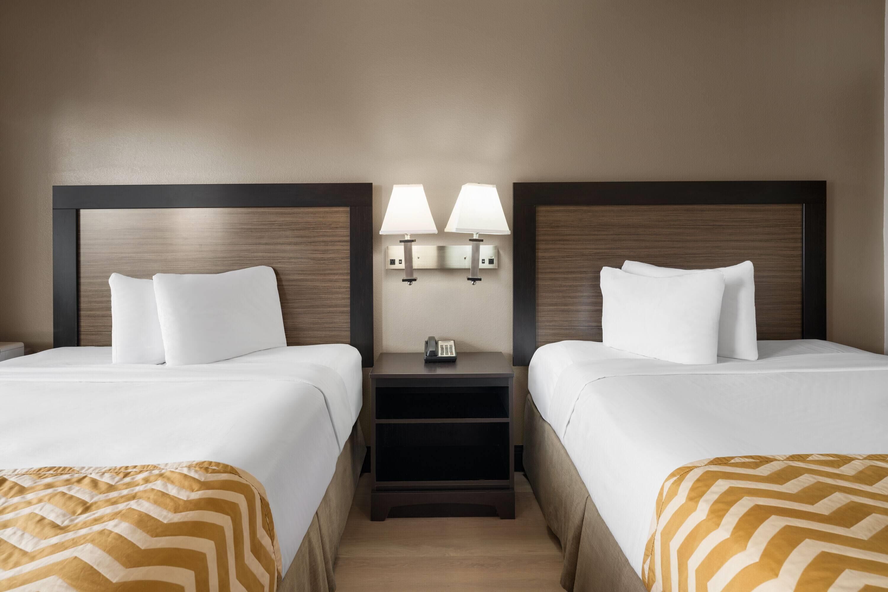 Habitación estándar, 2 camas Queen size, para no fumadores | Camas extra, wifi gratis y ropa de cama 