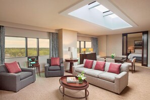 Junior Suite, 1 King Bed | Living area | 49-inch LCD TV with satellite channels, Smart TV, pay movies