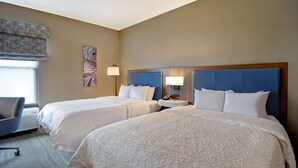 A hotel room with two beds, a desk, a chair, and a window with a view. - Hampton Inn Birmingham-Colonnade 280 (Birmingham)