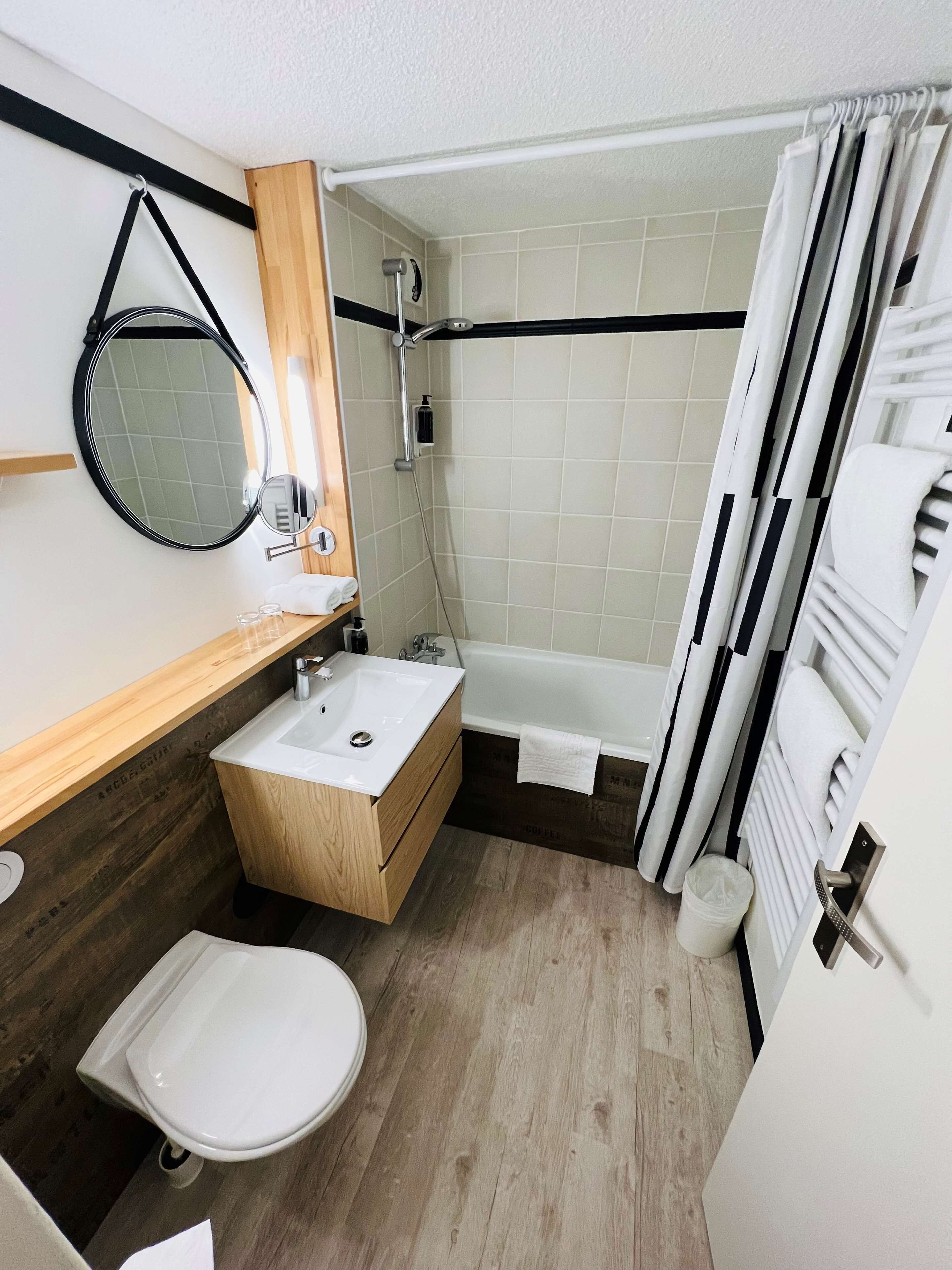 eco-friendly toiletries, hair dryer, towels, soap