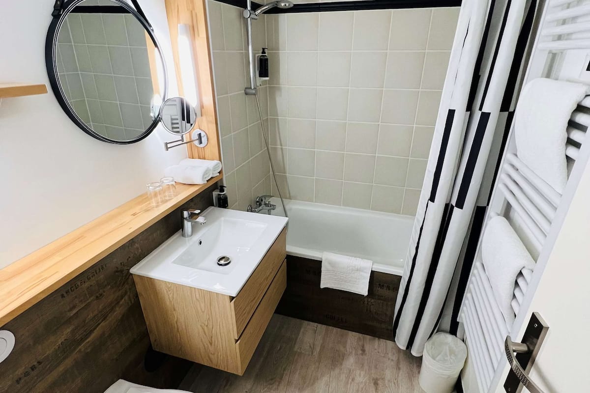 eco-friendly toiletries, hair dryer, towels, soap