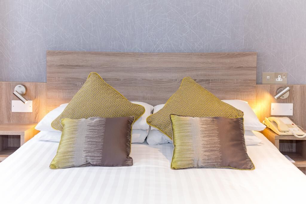 In-room safe, desk, blackout curtains, iron/ironing board (on request)