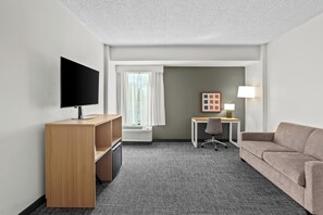 Roupas de cama premium, escrivaninha, cortinas blackout