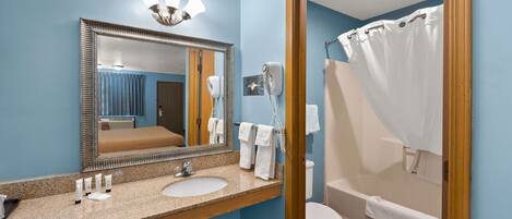 Rainfall showerhead, designer toiletries, hair dryer, towels