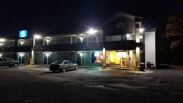 A multi-story motel with a visible 'W' logo on the building.