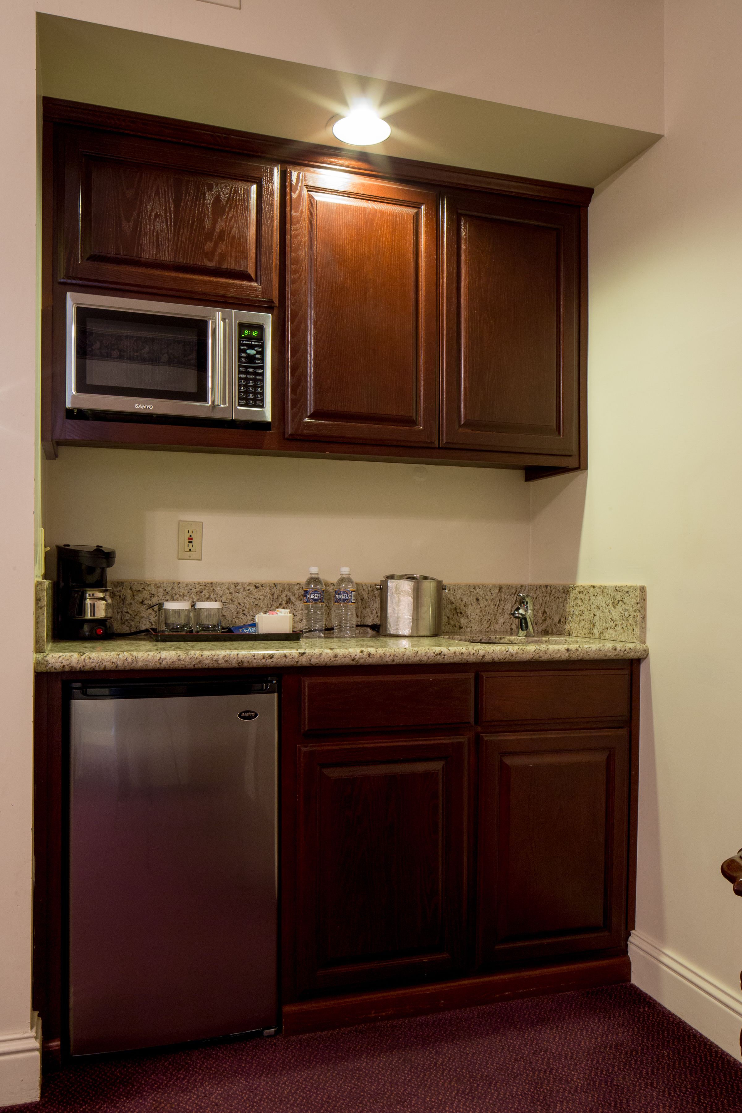 suite, 1 king bed with sofa bed, balcony, city view | private kitchenette | mini-fridge, microwave, coffee/tea maker