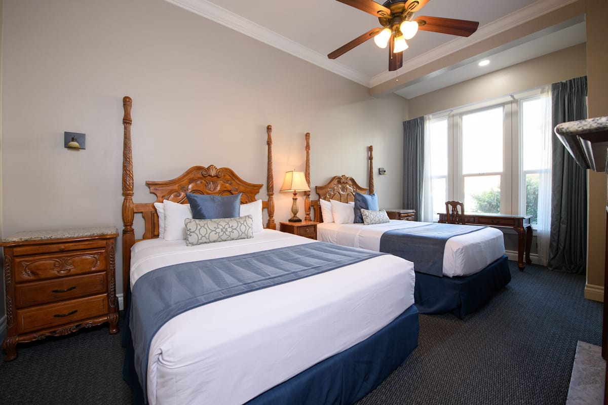 Room, 2 Queen Beds, Fireplace, City View | 1 bedroom, premium bedding, individually decorated, blackout drapes