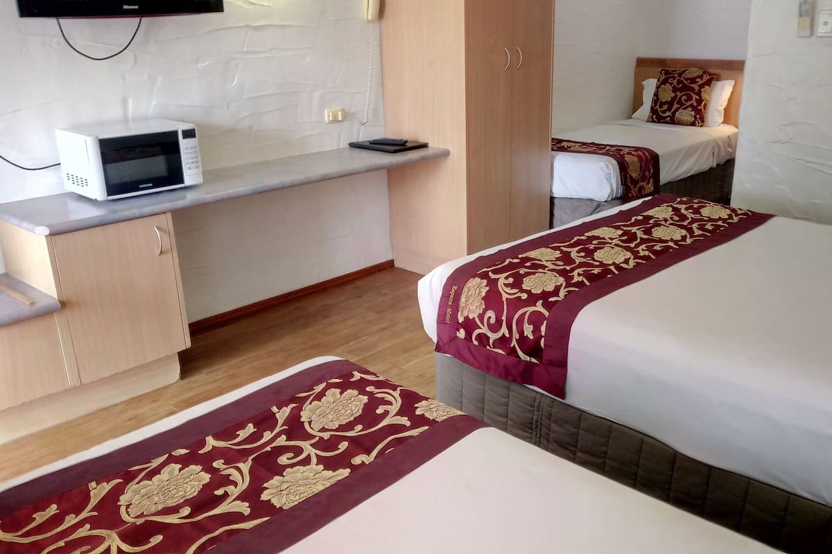 Premium bedding, desk, iron/ironing board, free WiFi