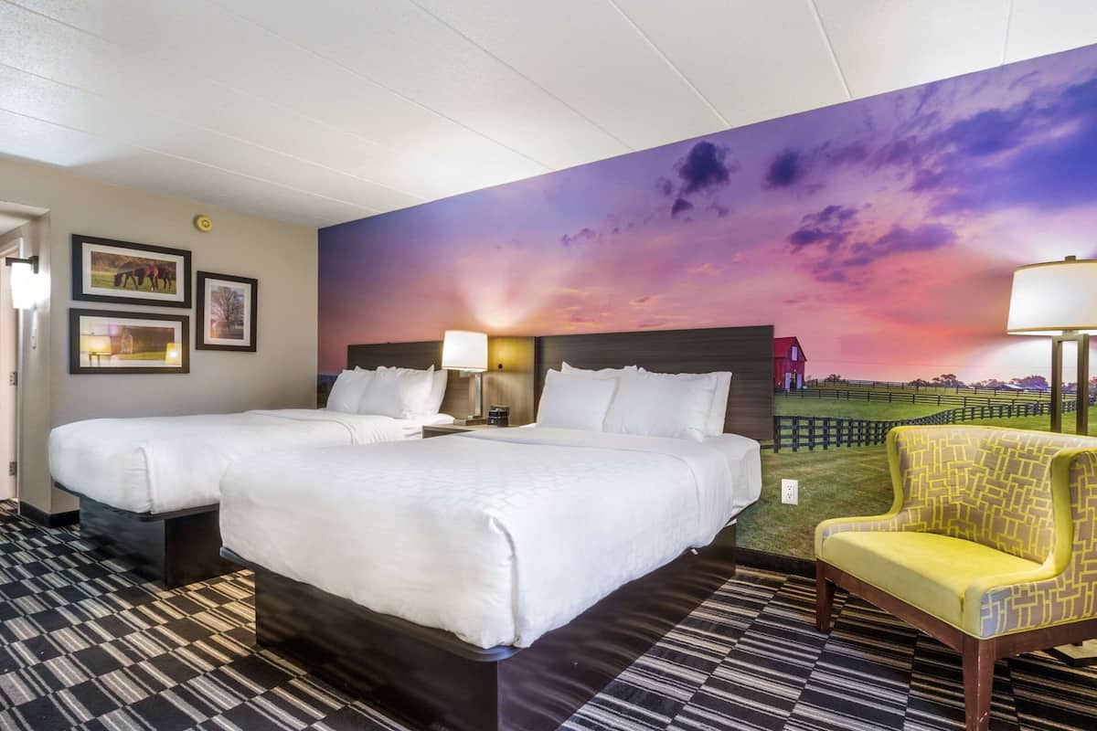 Premium bedding, desk, laptop workspace, iron/ironing board