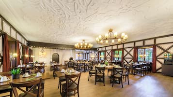 Breakfast, lunch, dinner served; international cuisine, garden views