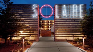 A building entrance with a large illuminated sign reading "SOLAIR". - Hotel Paradox, Autograph Collection (Santa Cruz)