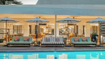 Outdoor pool, open 8:00 AM to 10:00 PM, cabanas (surcharge)