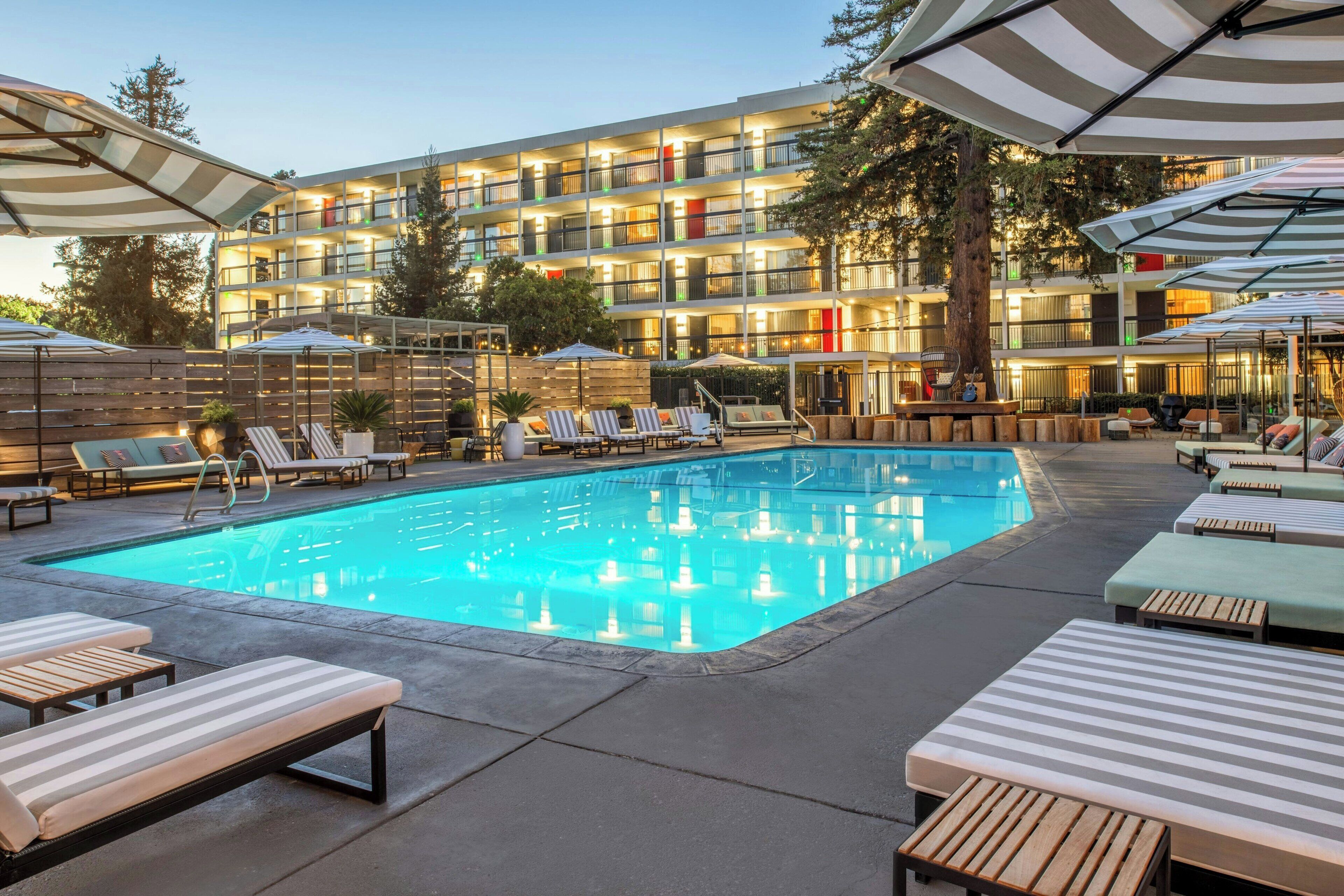 Outdoor pool, open 8:00 AM to 10:00 PM, cabanas (surcharge)