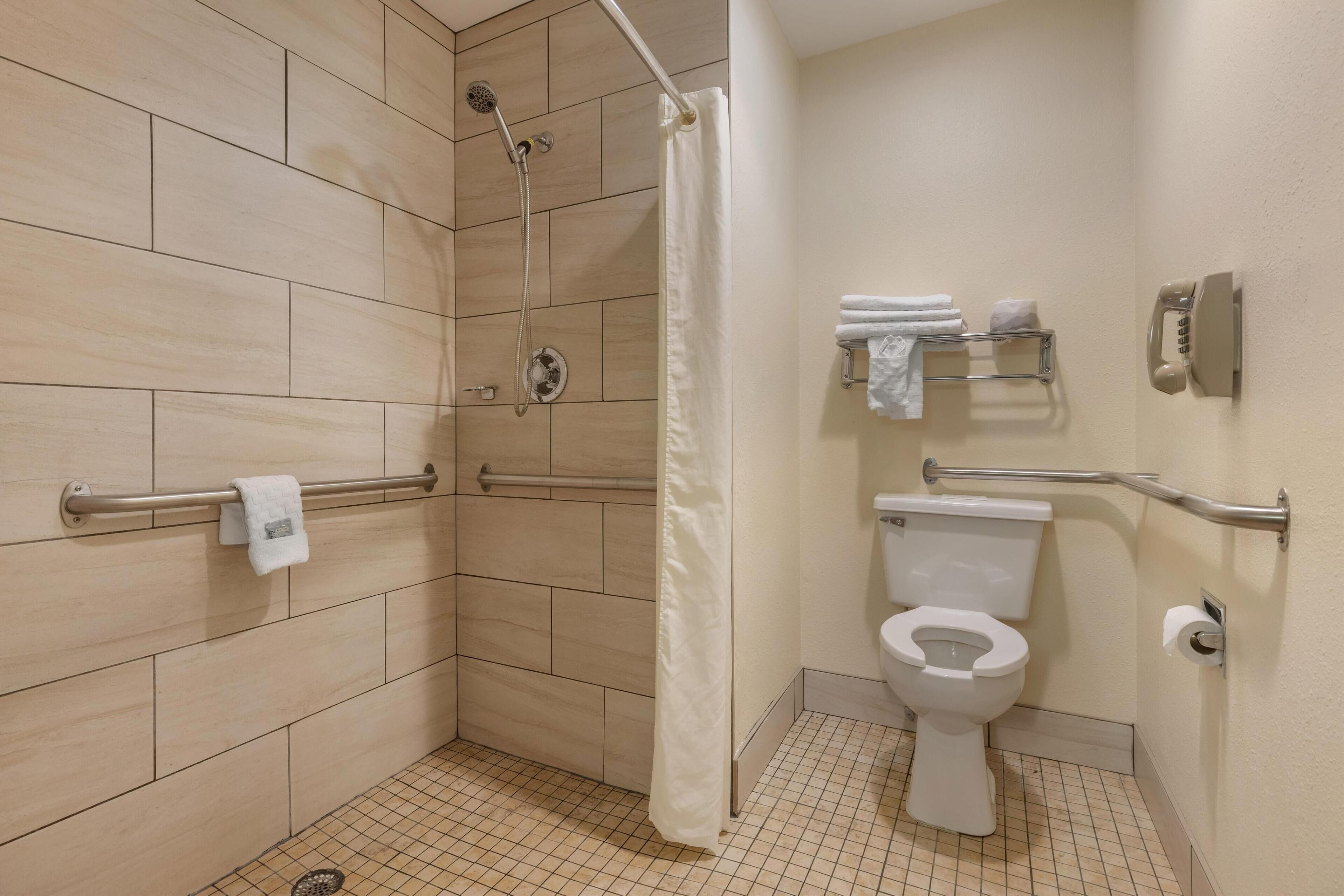 standard room, 2 double beds, accessible, non smoking | bathroom | combined shower/bathtub, free toiletries, hair dryer, towels