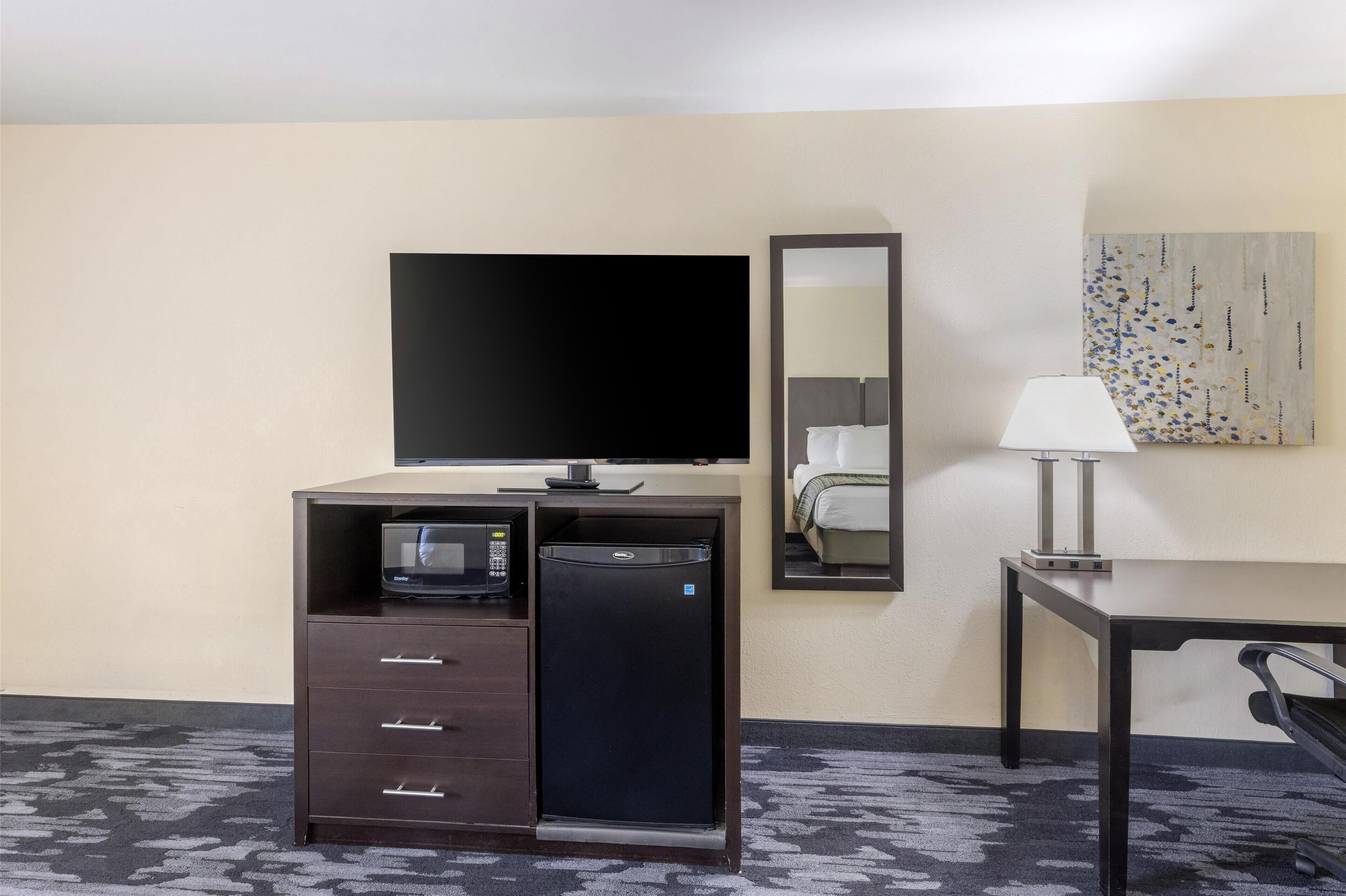 standard room, 2 double beds, non smoking, refrigerator & microwave | in-room safe, desk, iron/ironing board, free cots/infant beds