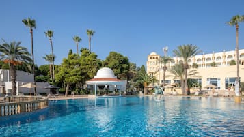Indoor pool, outdoor pool, pool umbrellas, pool loungers
