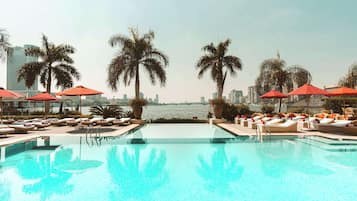 Outdoor pool, open 8:00 AM to 7:00 PM, pool umbrellas, pool loungers