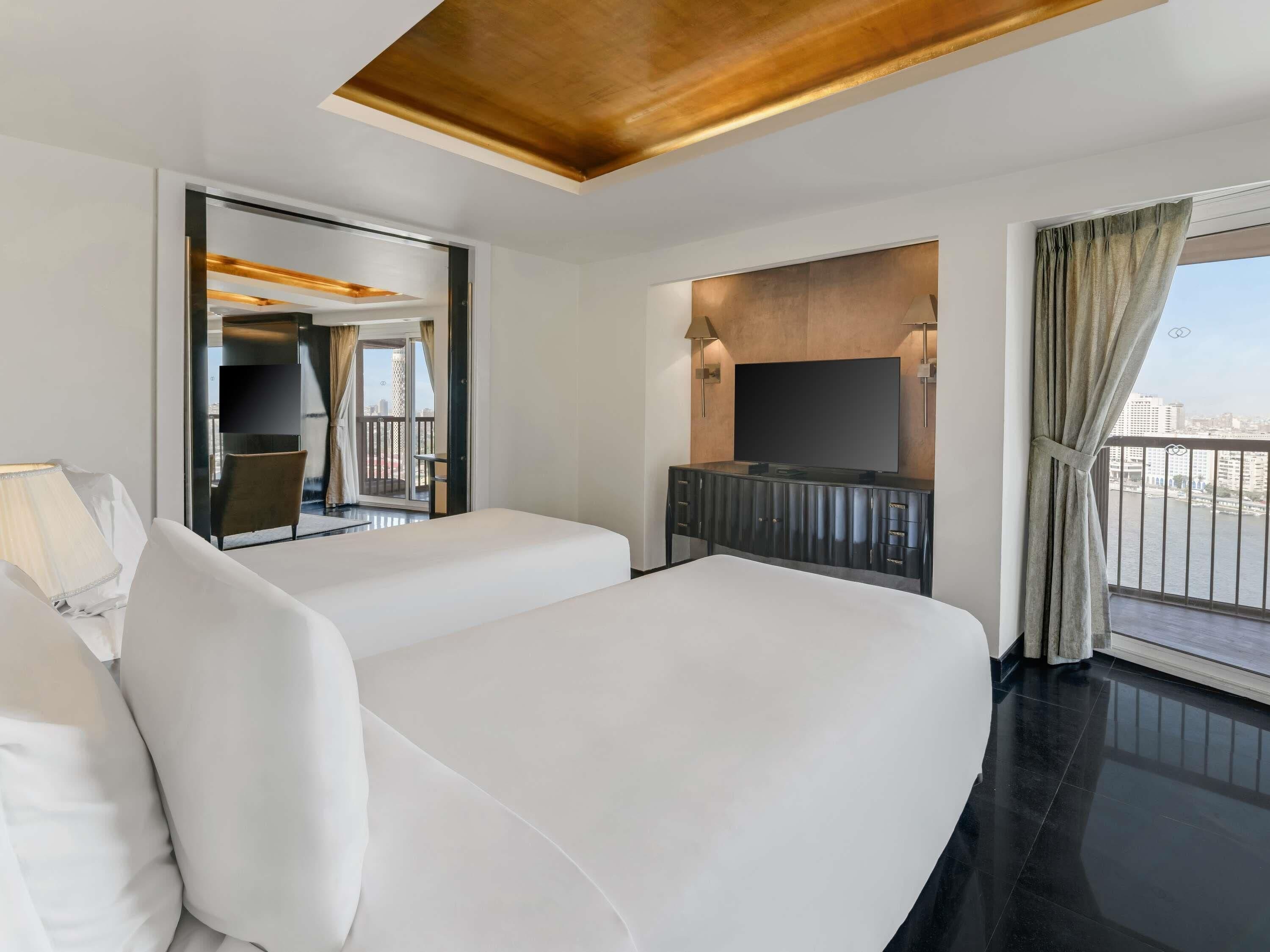 Suite Keluarga, 2 kamar tidur, pemandangan sungai | Seprai katun Mesir, seprai premium, minibar, dan brankas