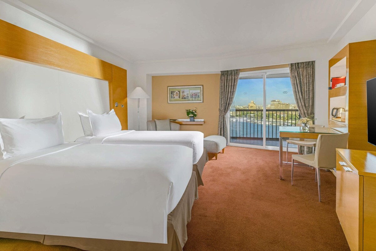 Egyptian cotton sheets, premium bedding, minibar, in-room safe