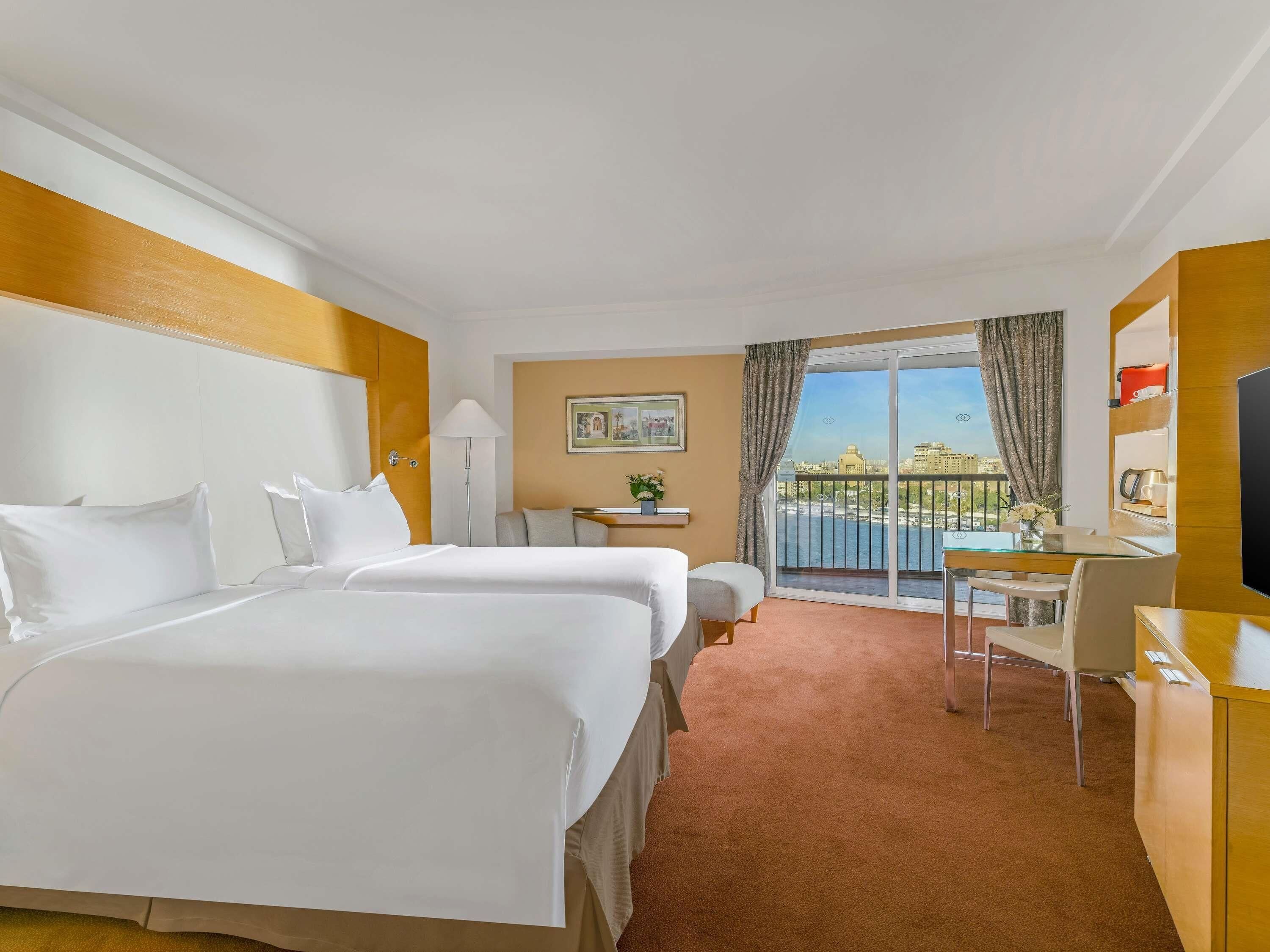 Lakens van Egyptisch katoen, luxe beddengoed, een minibar