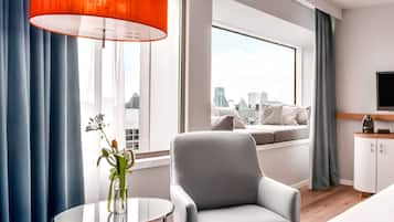 Junior Suite, 1 King Bed | Living area | 37-inch flat-screen TV with digital channels, TV