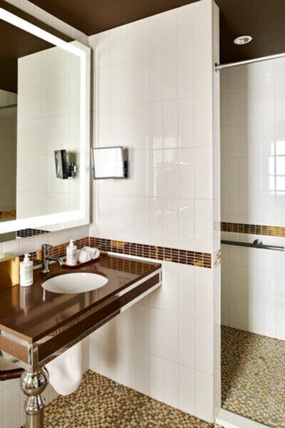 Rainfall showerhead, designer toiletries, hair dryer, bathrobes