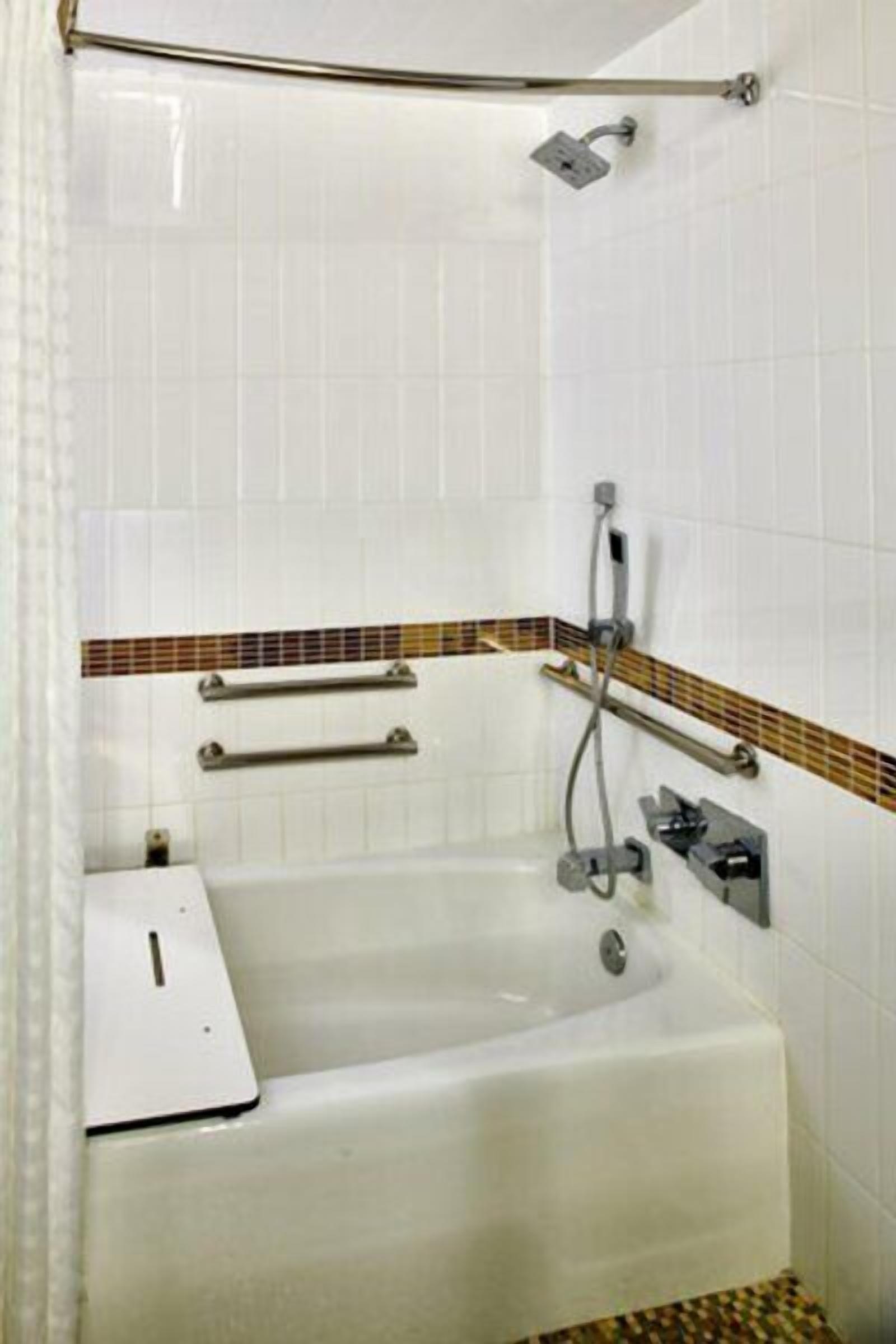 Rainfall showerhead, designer toiletries, hair dryer, bathrobes