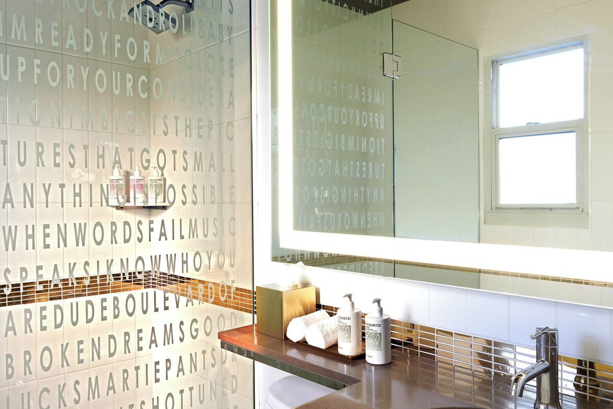 rainfall showerhead, designer toiletries, hair dryer, bathrobes