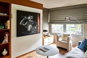 Room, 1 Double Bed, Pool View | Living area | 55-inch LCD TV with cable channels, TV, pay movies