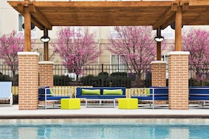 Seasonal outdoor pool, open 9:00 AM to 9:00 PM, sun loungers