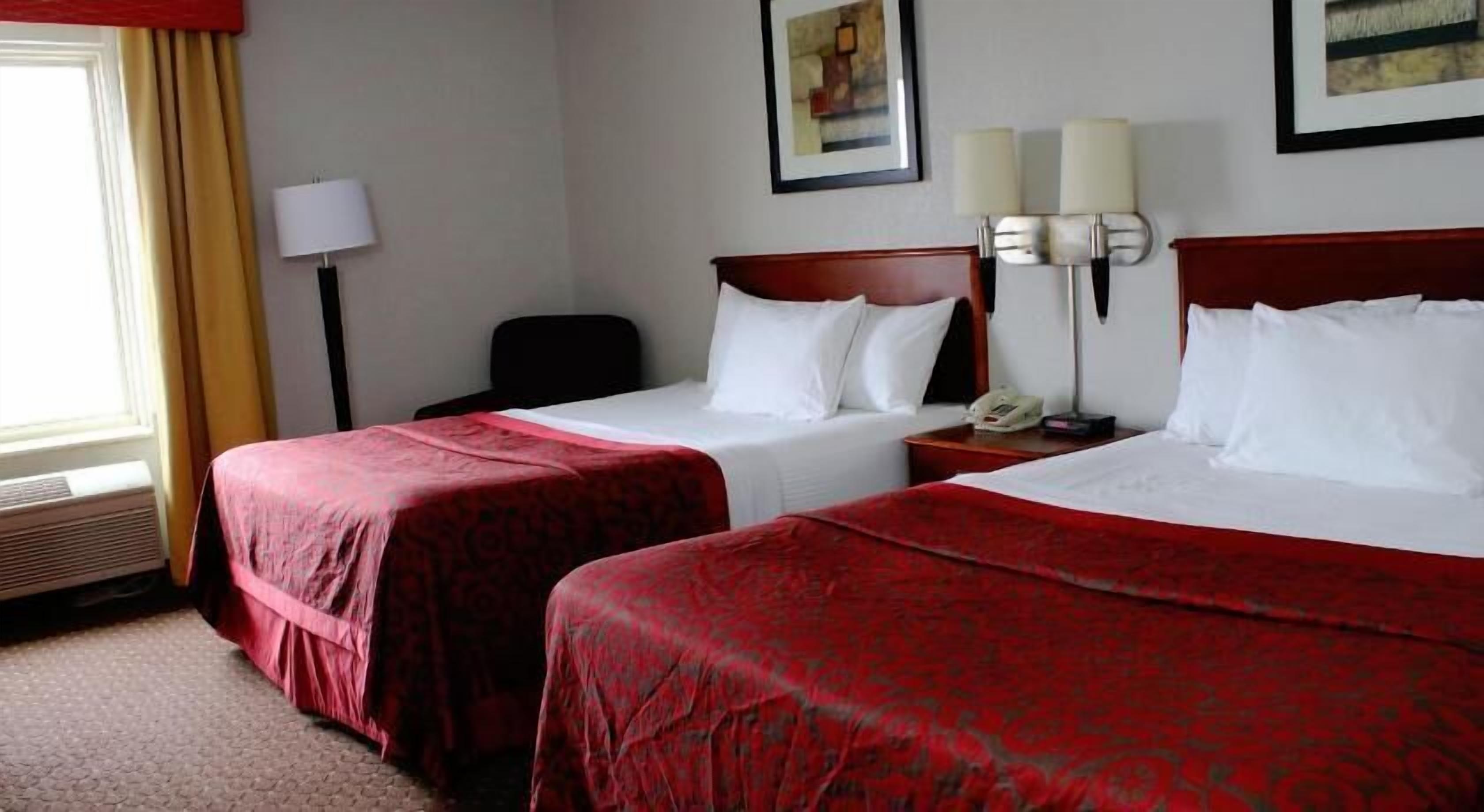 Premium bedding, desk, blackout drapes, iron/ironing board