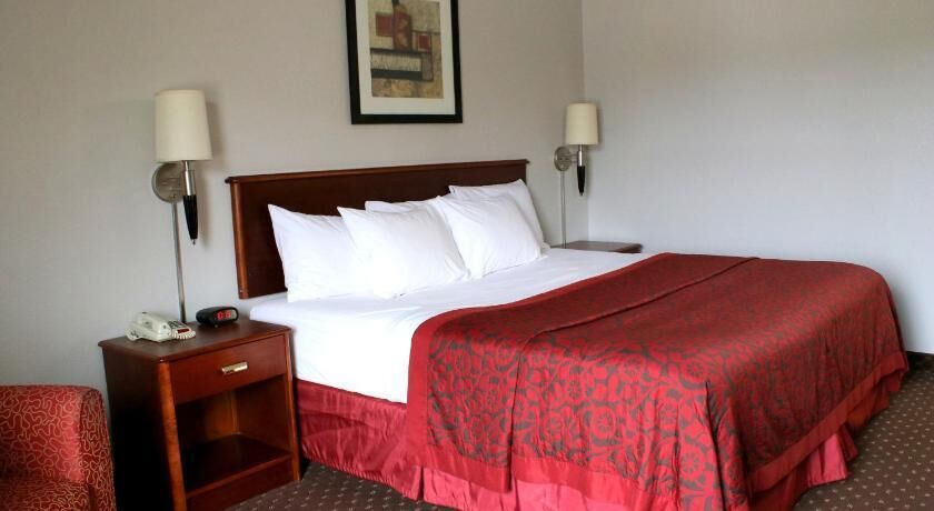 Premium bedding, desk, blackout drapes, iron/ironing board