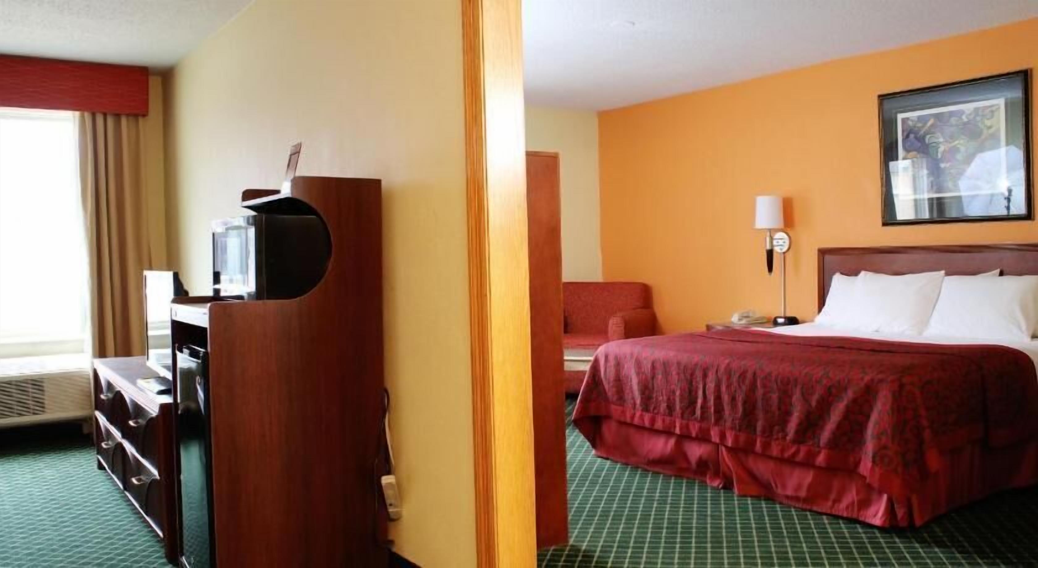 Premium bedding, desk, blackout drapes, iron/ironing board
