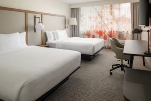 Premium bedding, down duvets, pillow-top beds, individually decorated
